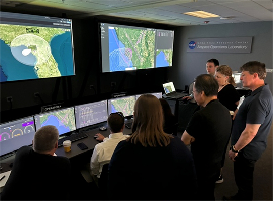 Image of the Higher Airspace/Upper Class E Traffic Management (HA/ETM) team conducting its second Collaborative Evaluation between NASA and various industry partners