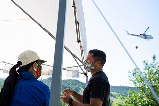 Joey Mercer, speaking with USFS and NASA executives during STEReO’s joint flight demonstration in Redding, CA.  The joint flight demonstration was held in parallel with the annual CAL FIRE Aerial Supervision Academy (CASA).