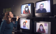 Image of a DTDM researcher monitoring a team in a research simulation.