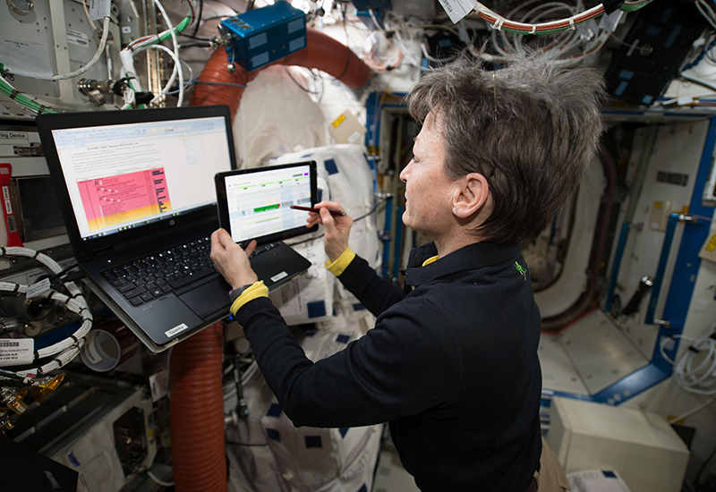 Astronaurt Peggy Whitson is using the Human Computer Interaction Group's Playbook Software in the International Space Station (ISS)