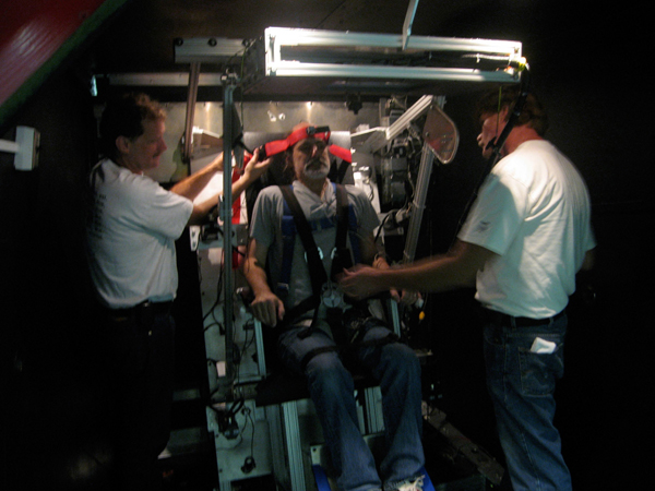 A NASA researcher is strapped into the Human Vibration Laboratory's Vibration Research Chair