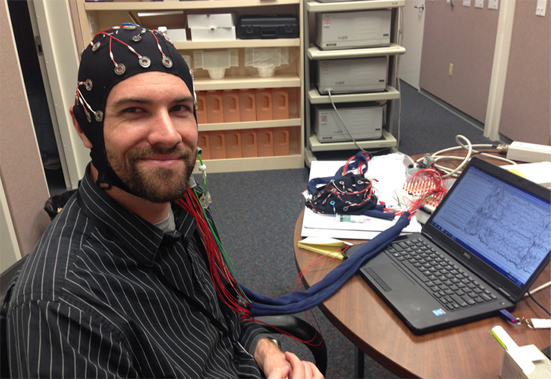 A research subject wearing an EEG cap during a Fatigue Countermeasures Research study